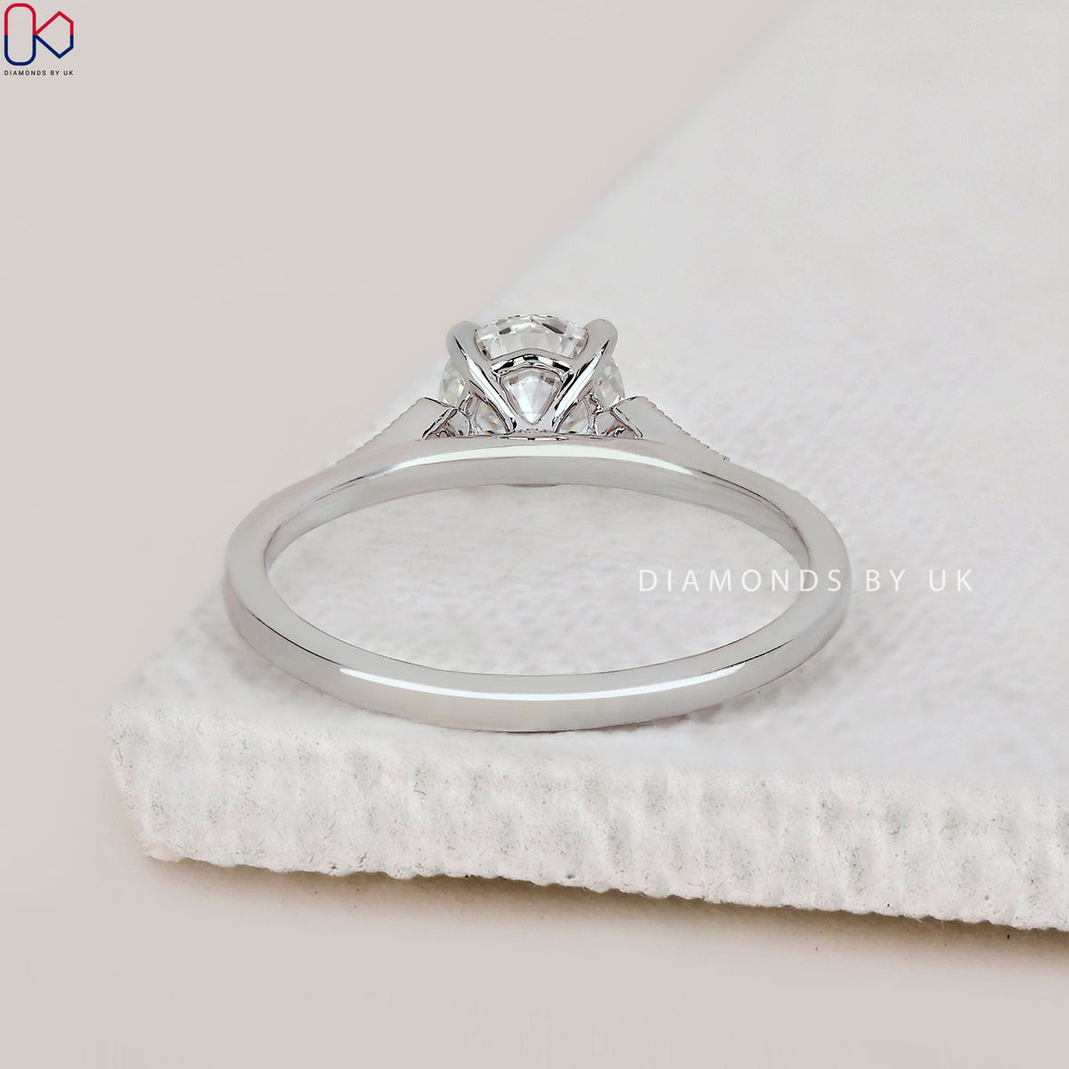 Round Diamond Side Stone Engagement Ring