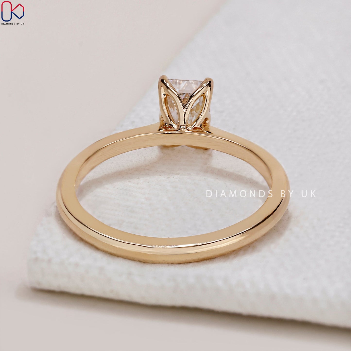 Emerald Cut Diamond Ring in Yellow Gold Setting
