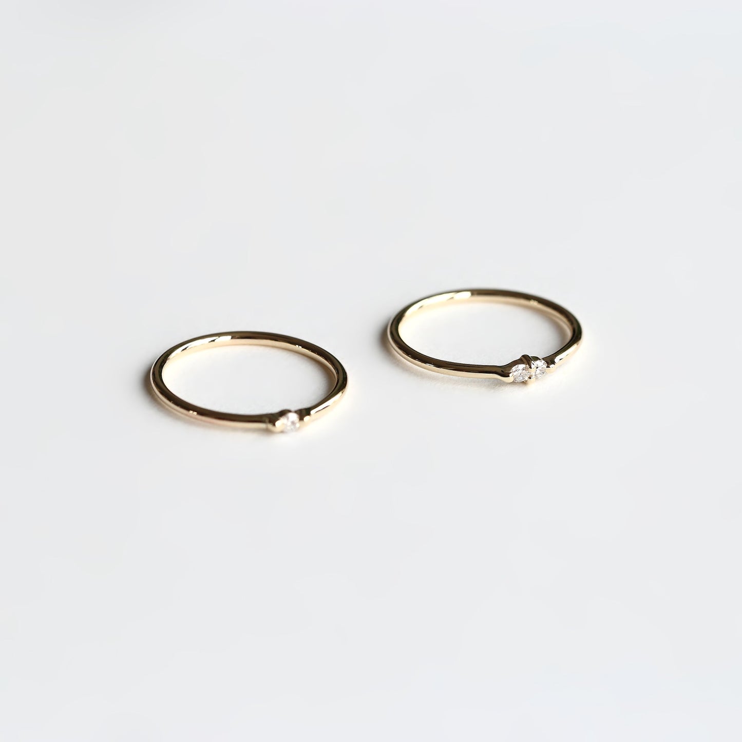 PAIRED WHITE DIAMOND RING