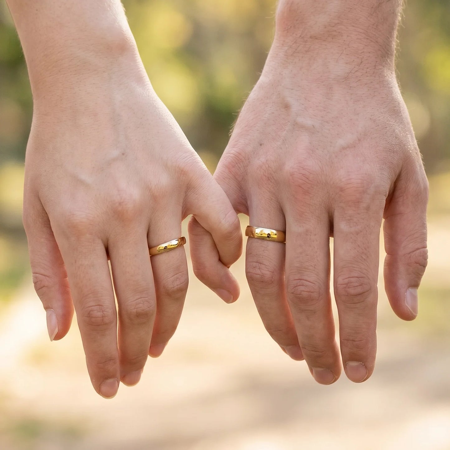 The Mirrored Pair – Polished Arc Wedding Bands in Solid Gold