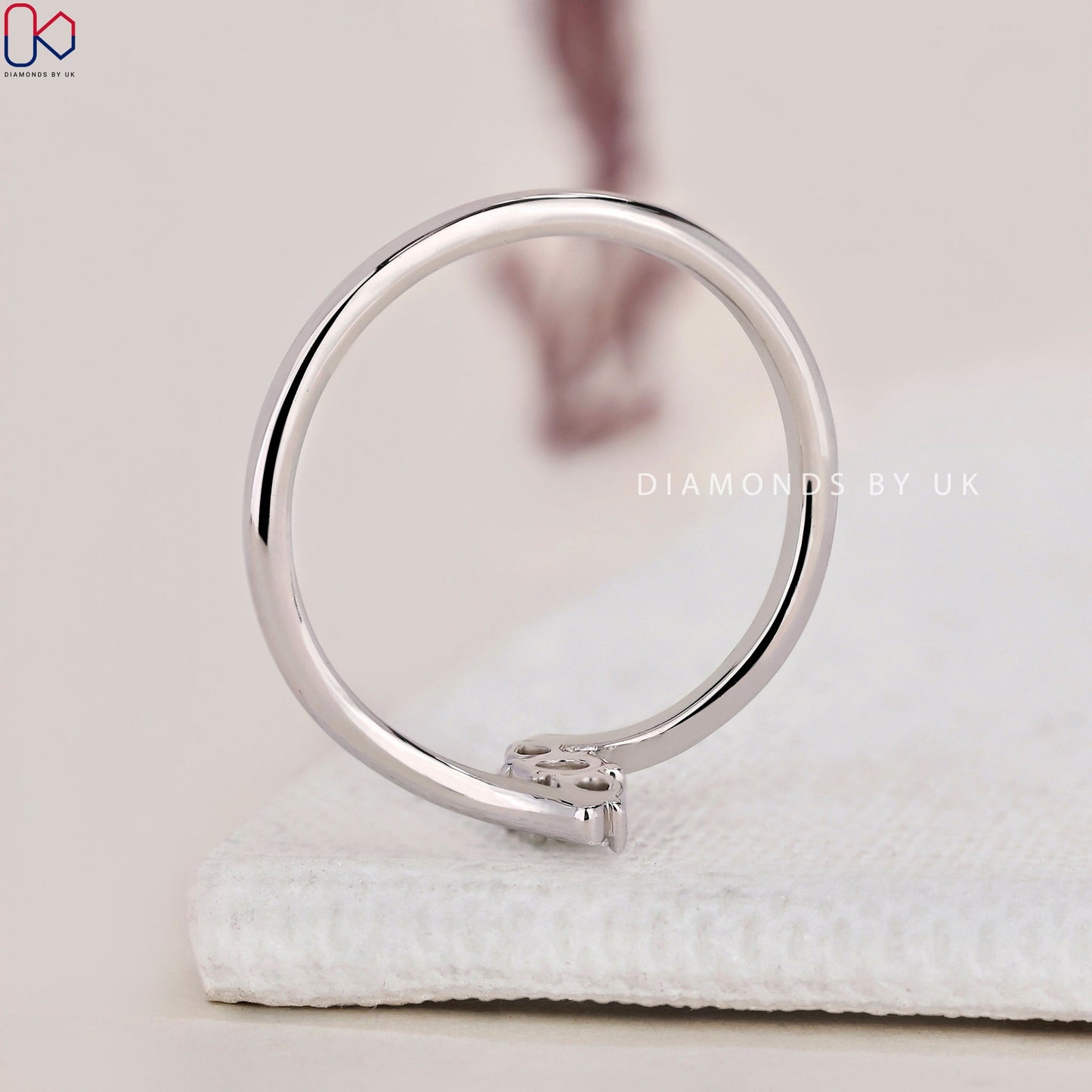 Round and Pear 3 Stone Diamond Ring