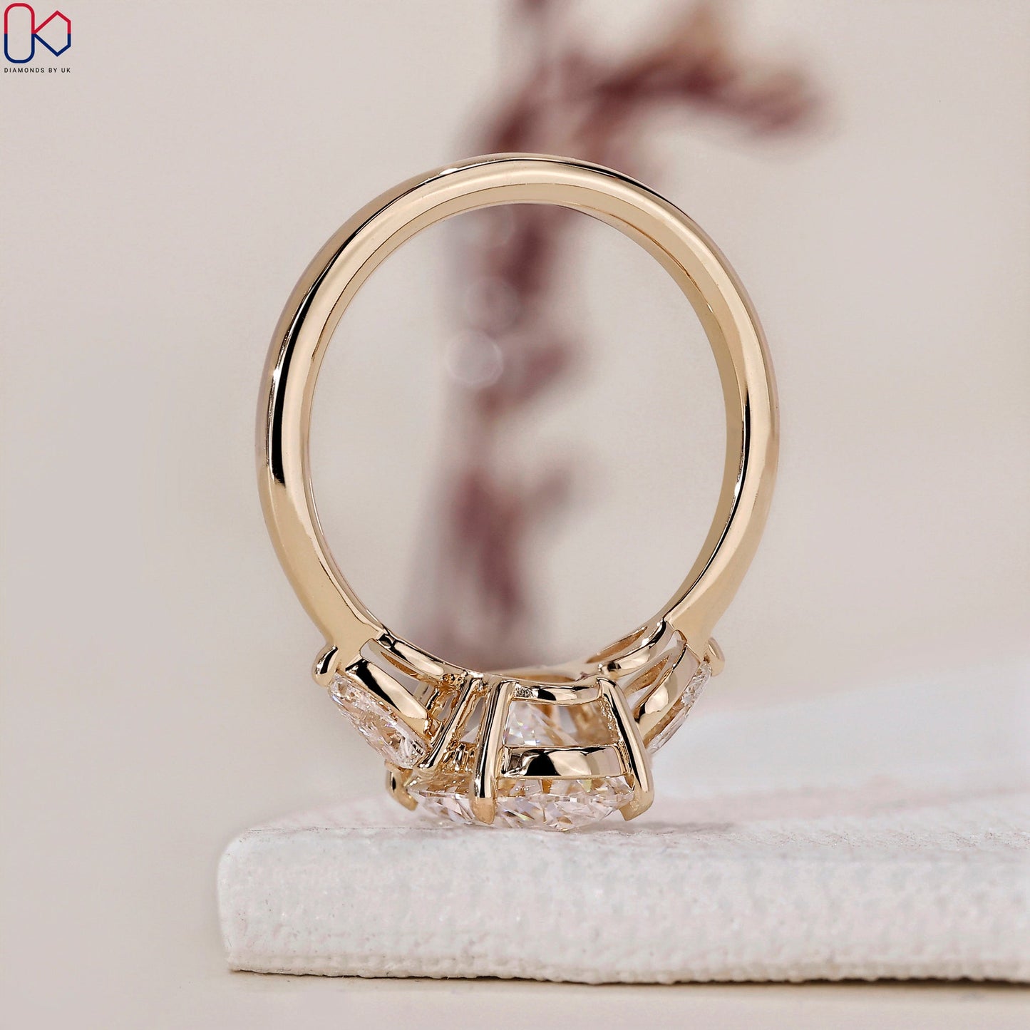 3 Stone Engagement Ring - Oval and Pear Diamond