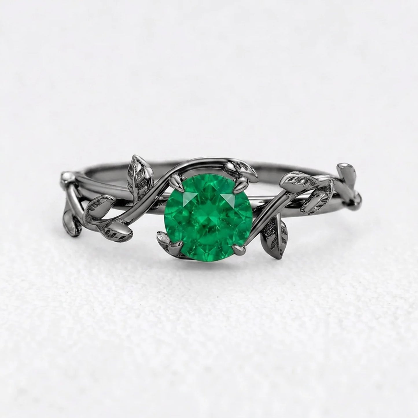 Isadora’s Eden | Round Emerald Foliage Engagement Ring