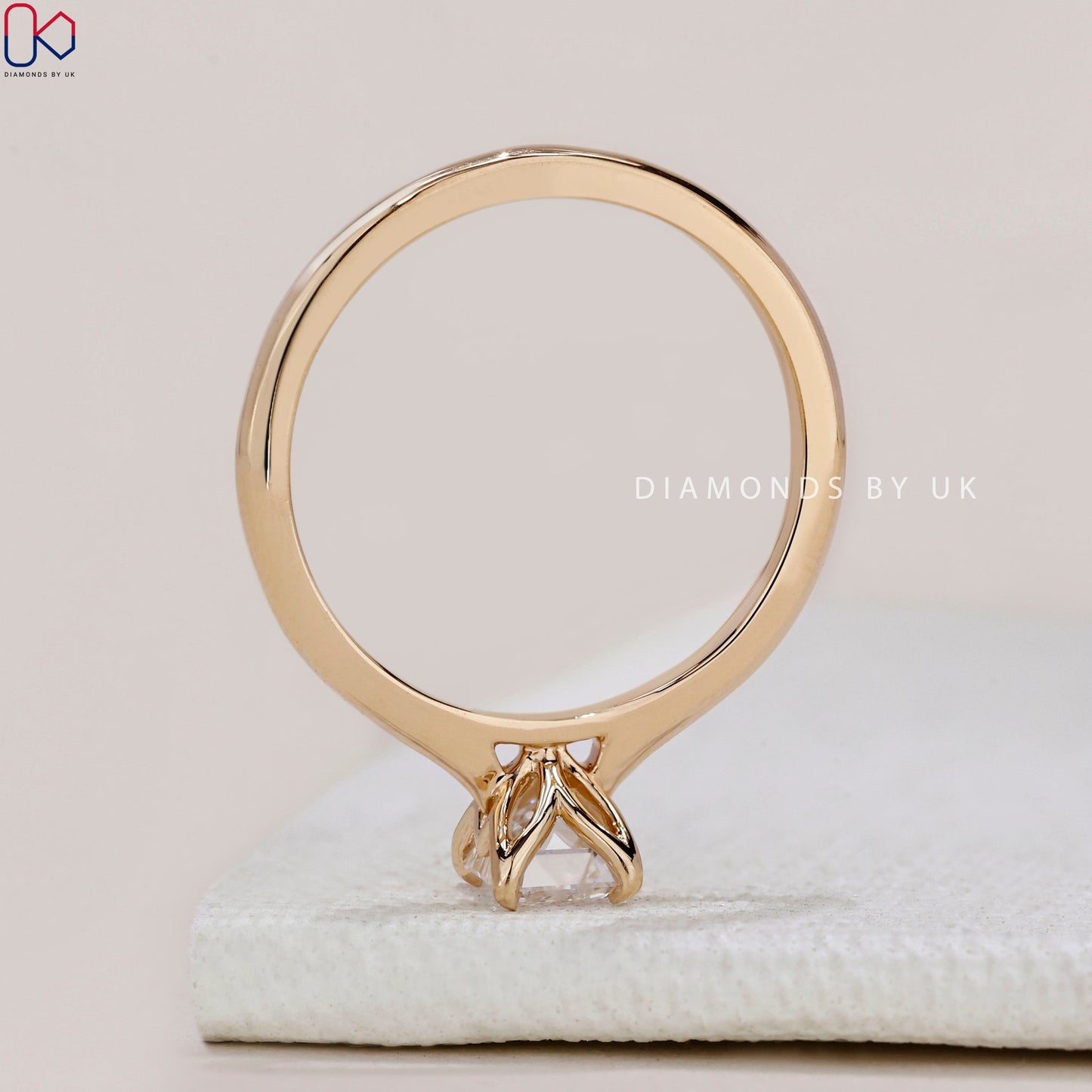 Emerald Cut Diamond Ring in Yellow Gold Setting