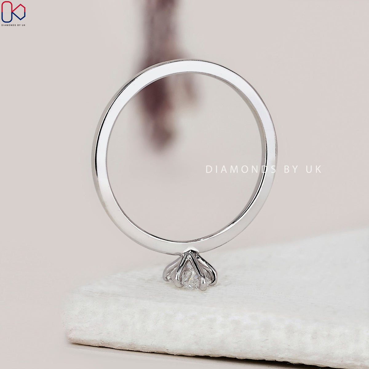 Solitaire Pear Shaped Diamond Ring In White Gold