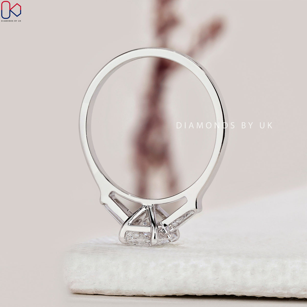 Radiant Cut Diamond Ring With Tapered Baguette Side Stone