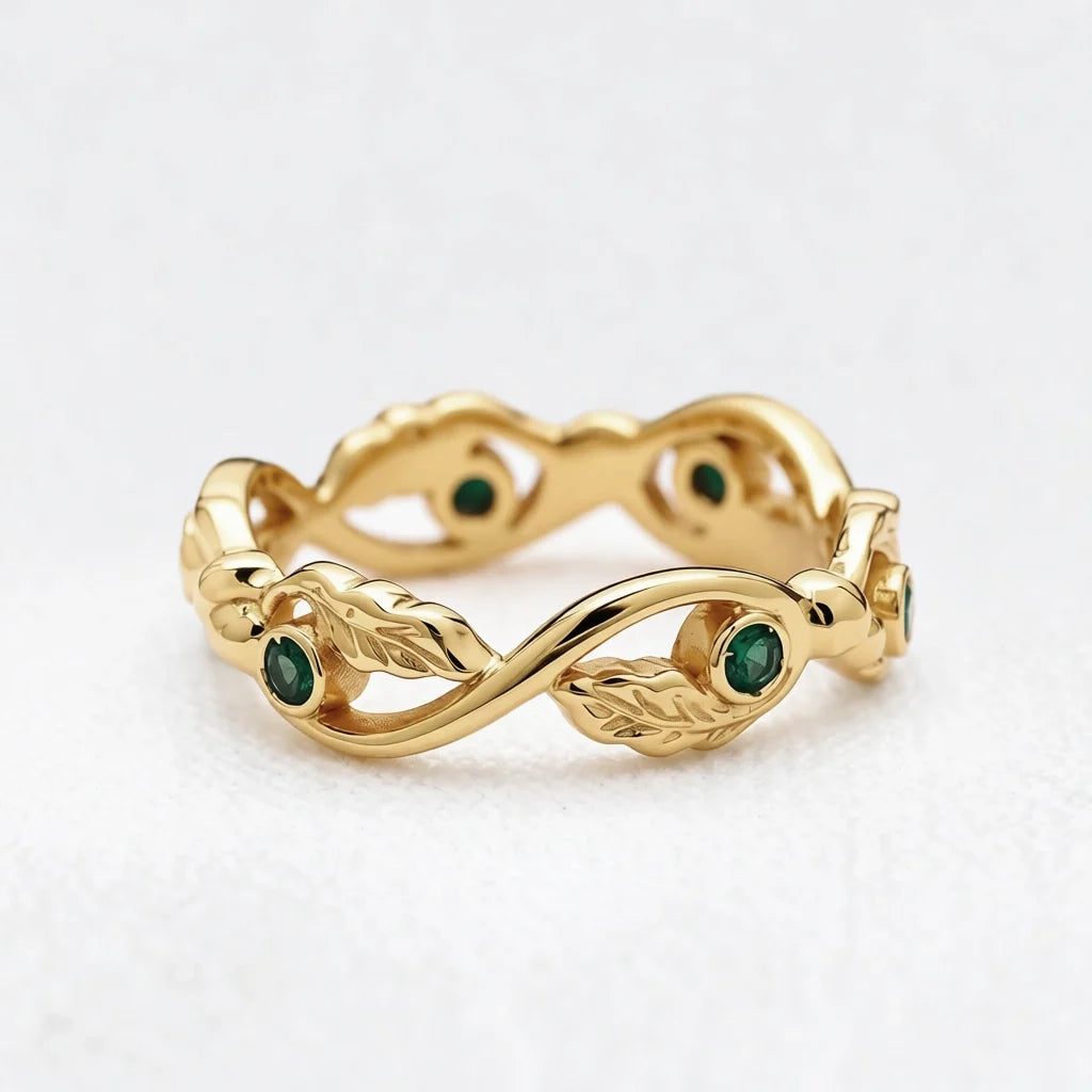 The Lacy Oak | Openwork Oak Leaves & Natural Emerald Women's Wedding Band