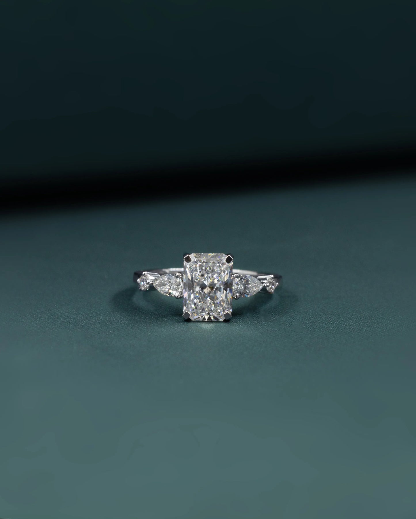 2.37 CTW Radiant Cut & Pear Side Stone Lab-Grown Diamond Three Stone Ring