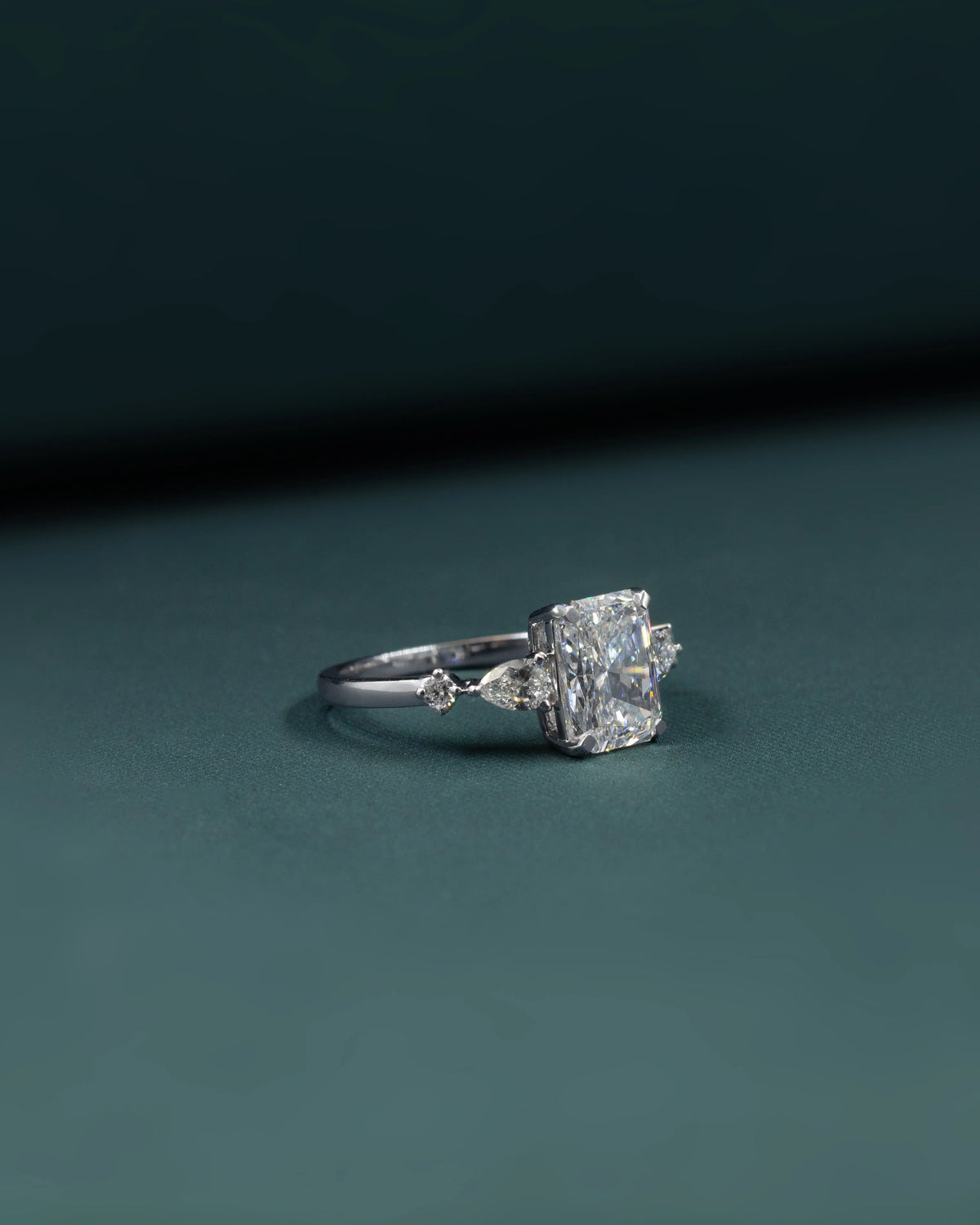 2.37 CTW Radiant Cut & Pear Side Stone Lab-Grown Diamond Three Stone Ring