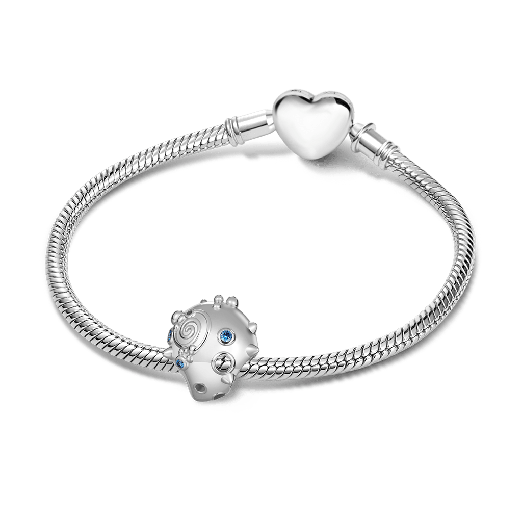 Gnoce Riveted Conch Charm
