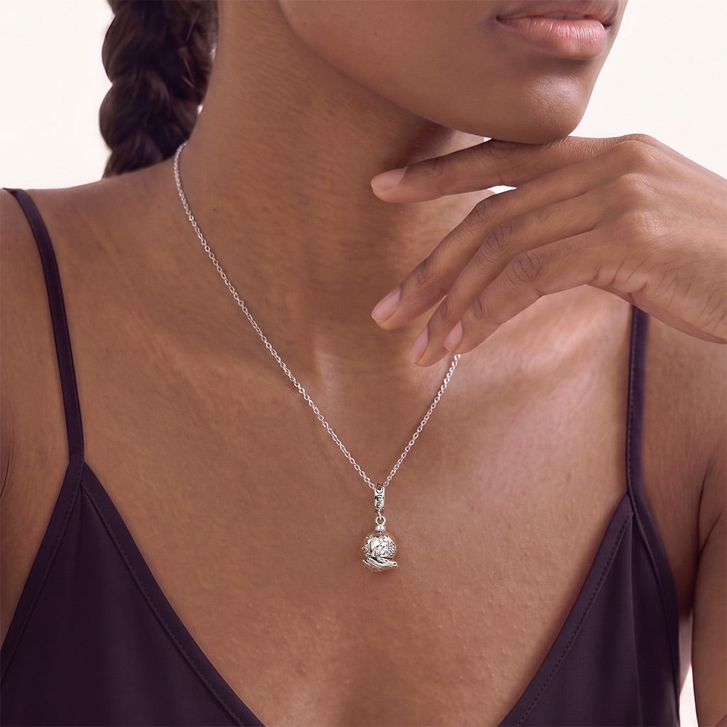 Gnoce  Holding A Rotating Earth Charm Platinum-plated Silver Blend