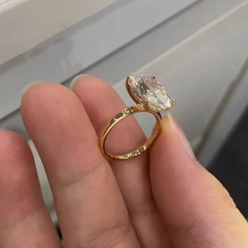 Simple Oval Cut Solitaire Engagement Ring