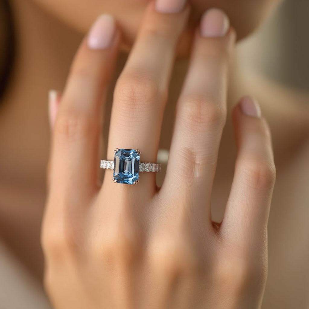 Marina’s Epoch | 3CT Emerald Cut Blue Sapphire Solitaire Engagement Ring