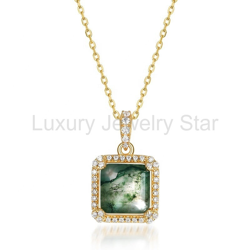 Front view of a square green-patterned halo pendant on a gold-tone chain against a white background.