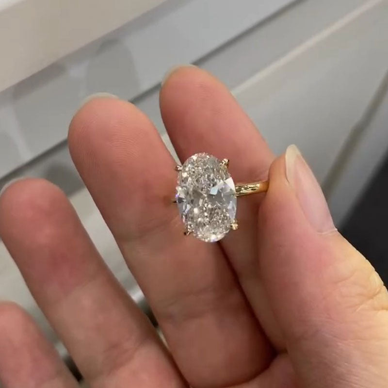 Simple Oval Cut Solitaire Engagement Ring