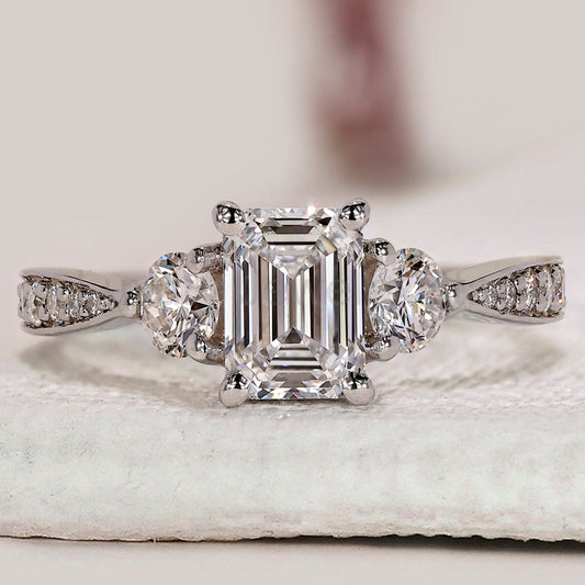 Emerald Cut Diamond Ring With Tapered Pave Band