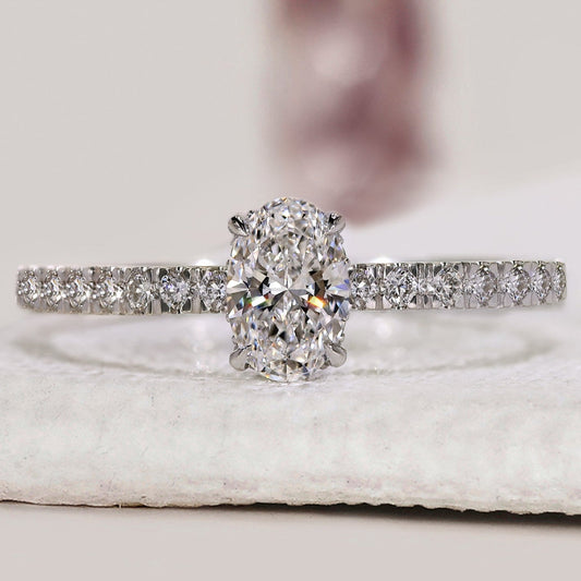 Gold Oval Diamond Engagement Ring In Pave Setting