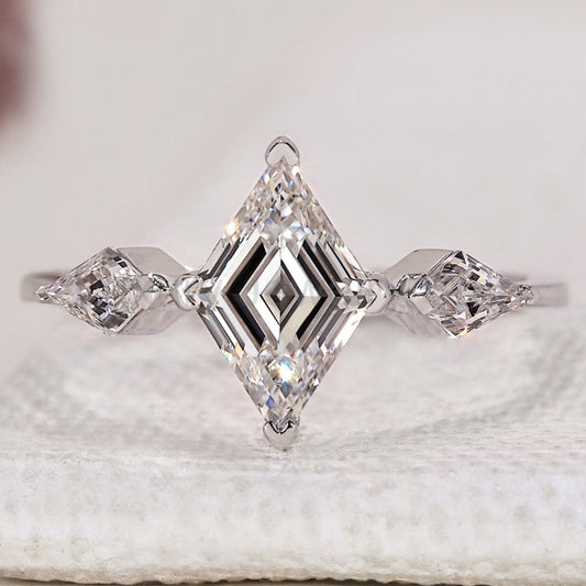 Lozenge Cut Diamond Ring With Kite Side Stones