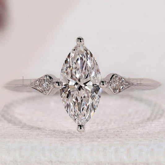 Marquise and Round Diamond engagement Ring In White Gold