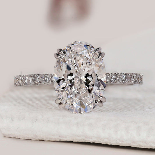 Oval Cut Diamond Ring In Pave Setting