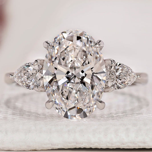 Oval Cut Three Stone Diamond Ring