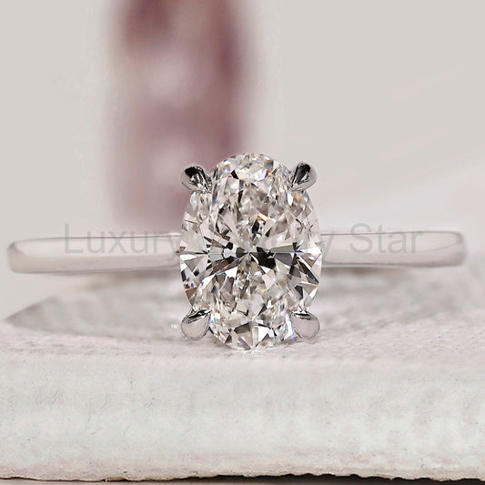 Oval Solitaire Engagement Ring With Cathedral Setting