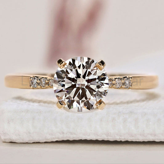 Round Cut Diamond Ring With Pinched Shank Band