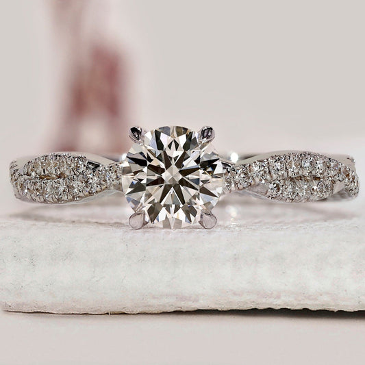 Round Cut Diamond Ring With Twisted Pave Set