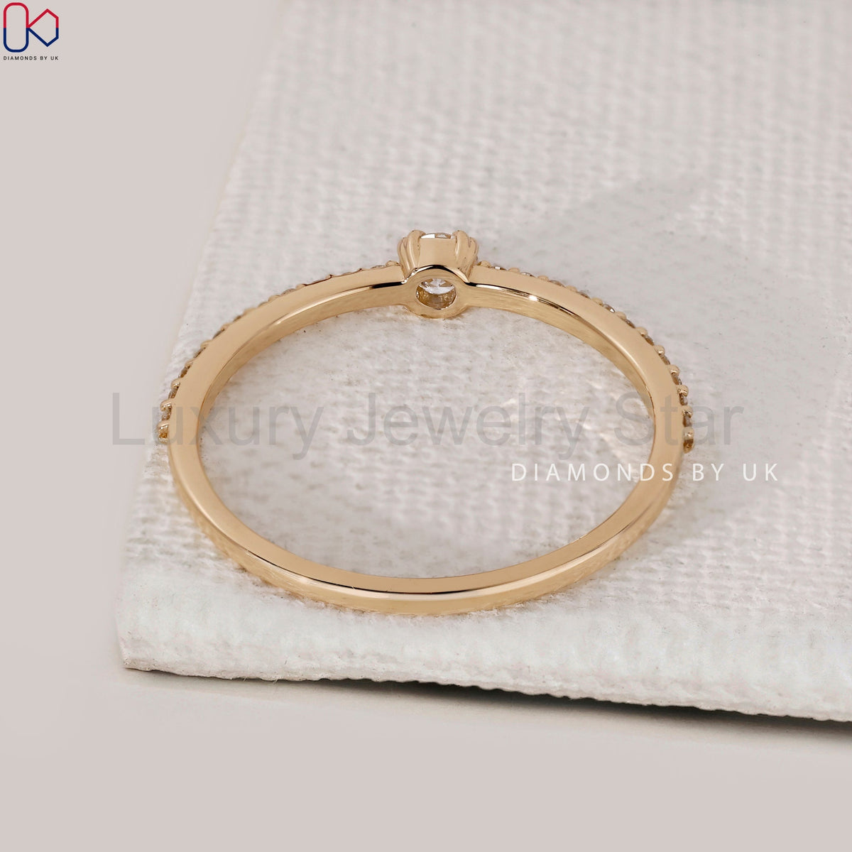 Round Cut Engagement Ring In Yellow Gold - image 4