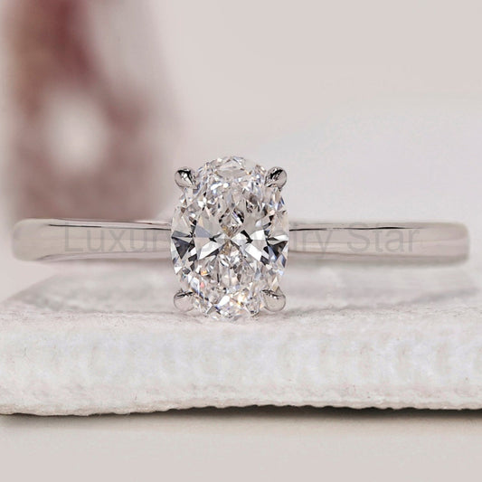 Solitaire Oval Cut Diamond Ring with Cathedral Setting