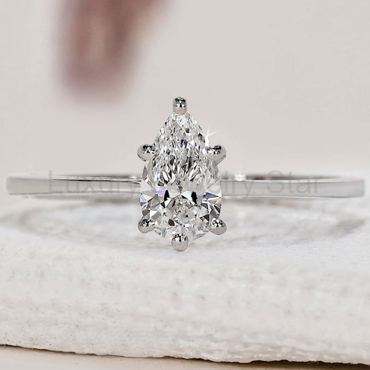 Solitaire Pear Shaped Diamond Ring In White Gold