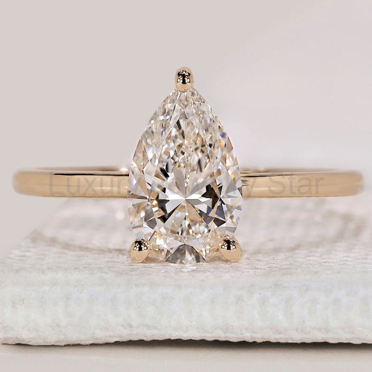 Yellow Gold Pear Solitaire Engagement Ring