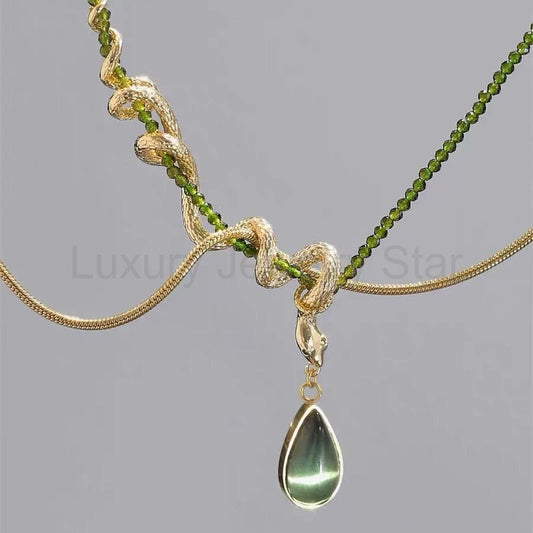 Thalia- Pear Cut Green Peridot Unique Serpent Shape Necklace