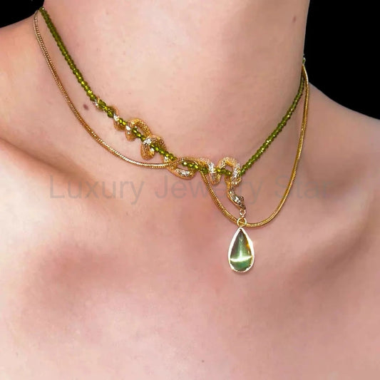 Thalia- Pear Cut Green Peridot Unique Serpent Shape Necklace - image 2