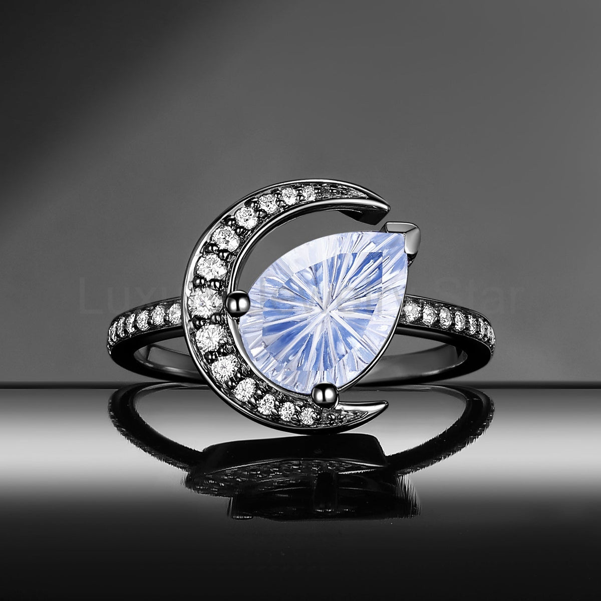 'Moonlit Reverie' - Fantasy Cut Pear Blue Sandstone Tilted Crescent Moon Engagement Ring