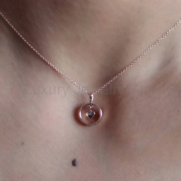 Heart charm necklace in 14k gold