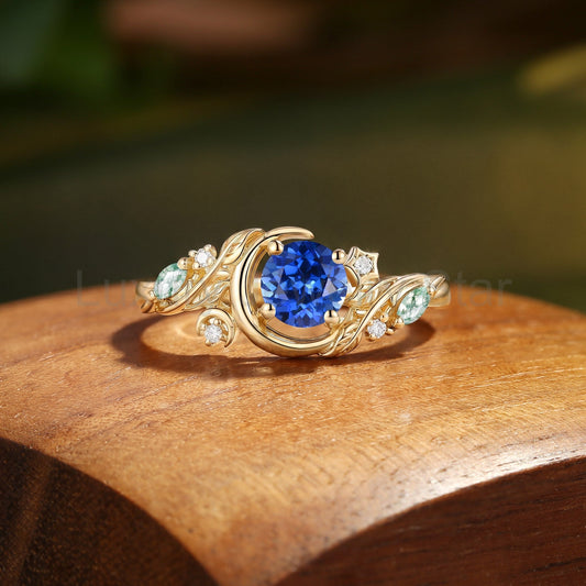 Crescent Moon & Botanical Leaf Round Cut Blue Sapphire Engagement Ring - Sylvaine