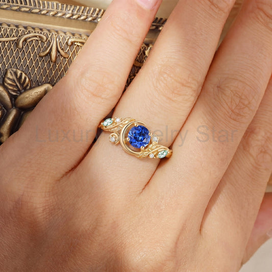 Crescent Moon & Botanical Leaf Round Cut Blue Sapphire Engagement Ring - Sylvaine