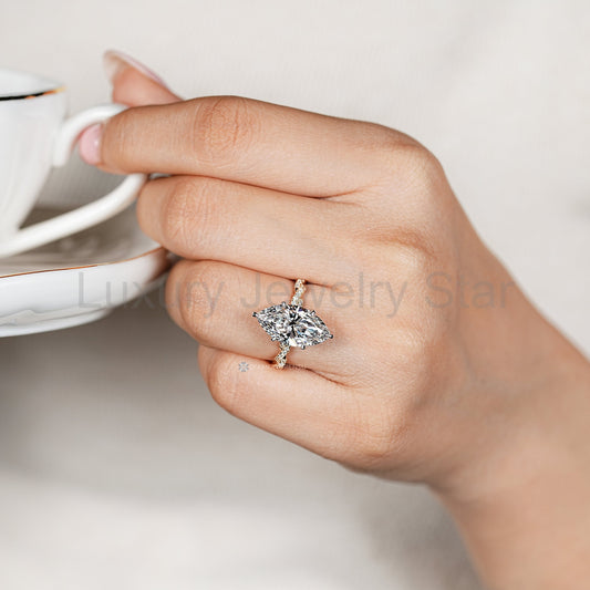 Marquise Engagement Ring with Twisted Shank and Round Accents - image 2