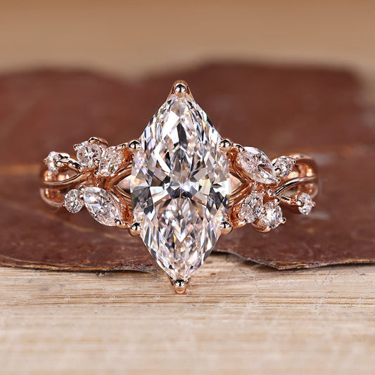 Nature Inspired Marquise Cut Diamond Ring with Side Stones