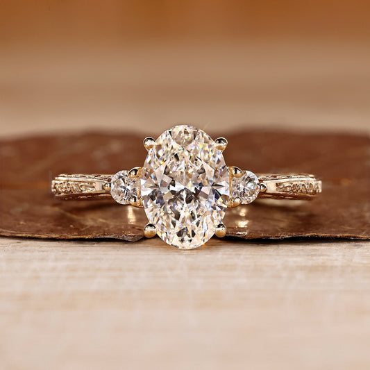Oval and Round Cut Three Diamond Ring in Filigree Design