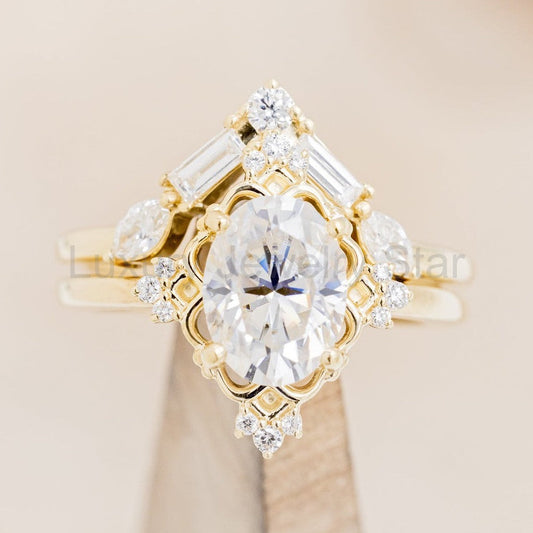 "Treva" - Oval Moissanite Engagement Ring With Diamond Accents & "Melody" Tracer