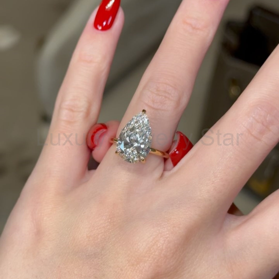 Refined Hidden Halo Pear Cut 4.0ct Engagement Ring In Sterling Silver