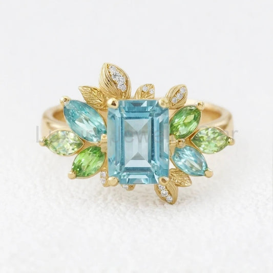 Celeste’s Bloom | Emerald Cut Blue Topaz Leafy Engagement Ring