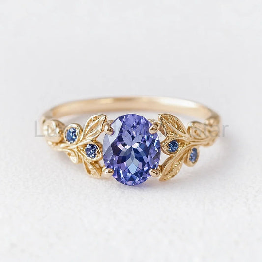Aria‘s Glade | 1.5CT Oval Cut Tanzanite & Blue Sapphire Leaf Engagement Ring