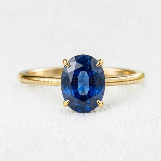 Elara‘s Glacier | 2CT Oval Blue Sapphire Solitaire Engagement Ring