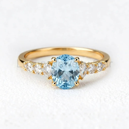 Celia’s Aqua | Oval Sea Blue Sapphire Engagement Ring