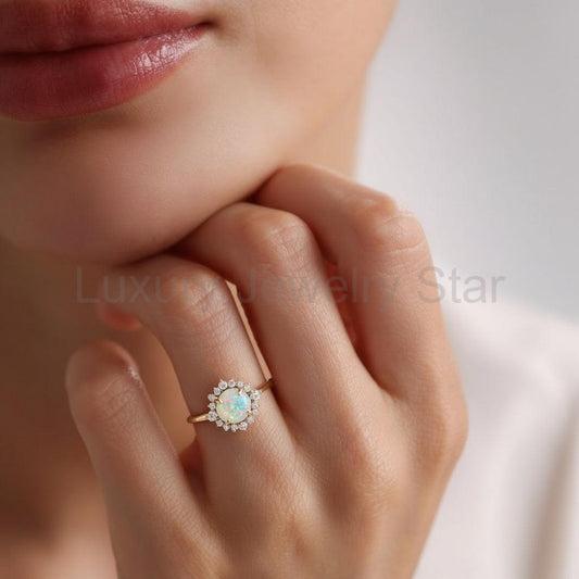 Valencia’s Sunburst | Round Opal & Moissanite Halo Ring