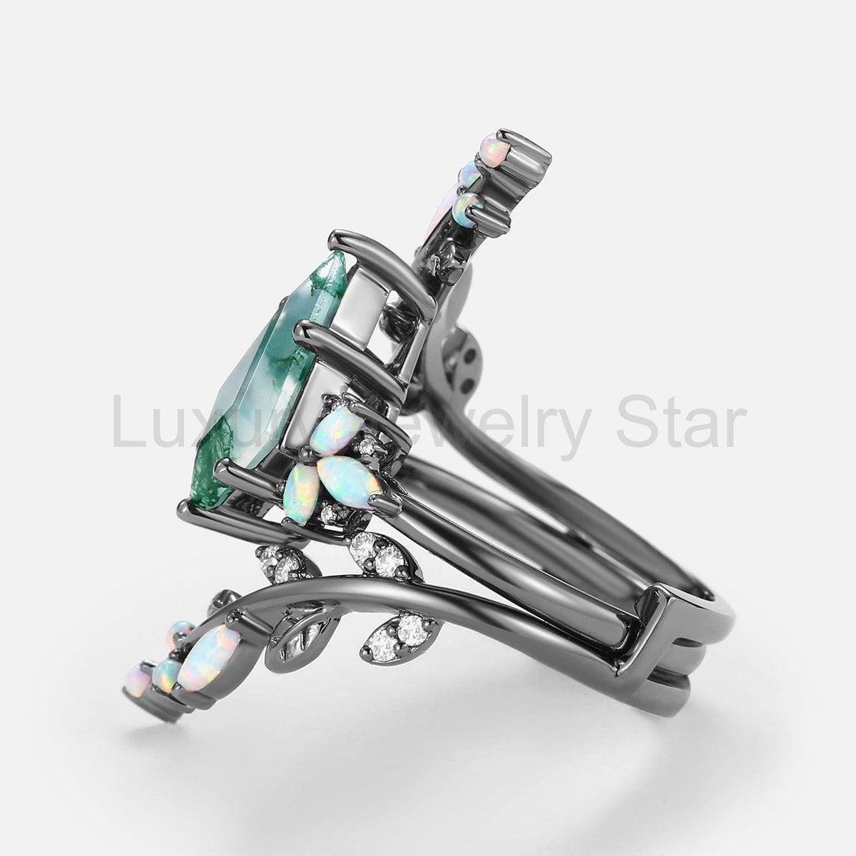 Nyx’s Enclosure | Black Gold Kite Cut Moss Agate & Opal Cage Leafy Engagement Ring Set - image 3