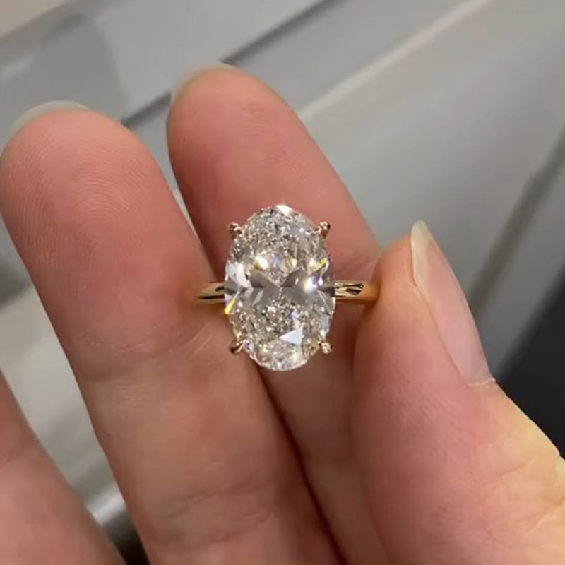 Simple Oval Cut Solitaire Engagement Ring